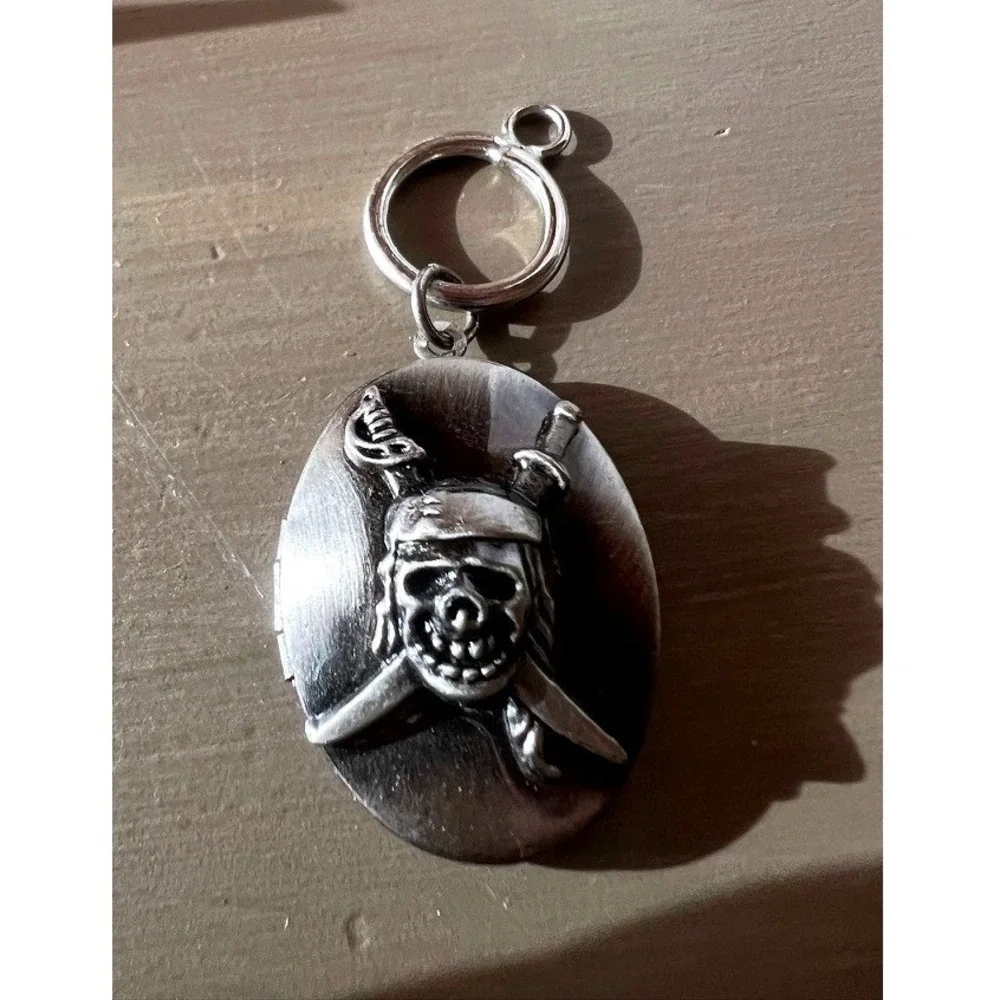 Disney Pirates of the Caribbean Locket Keychain Jack Sparrow Skull Silver Tone